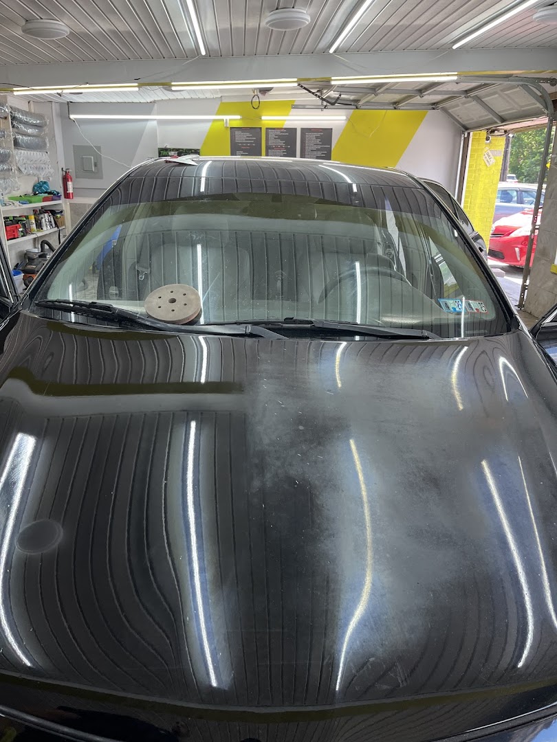 Window tint film professionally applied to vehicle glass at DETAILING PRO